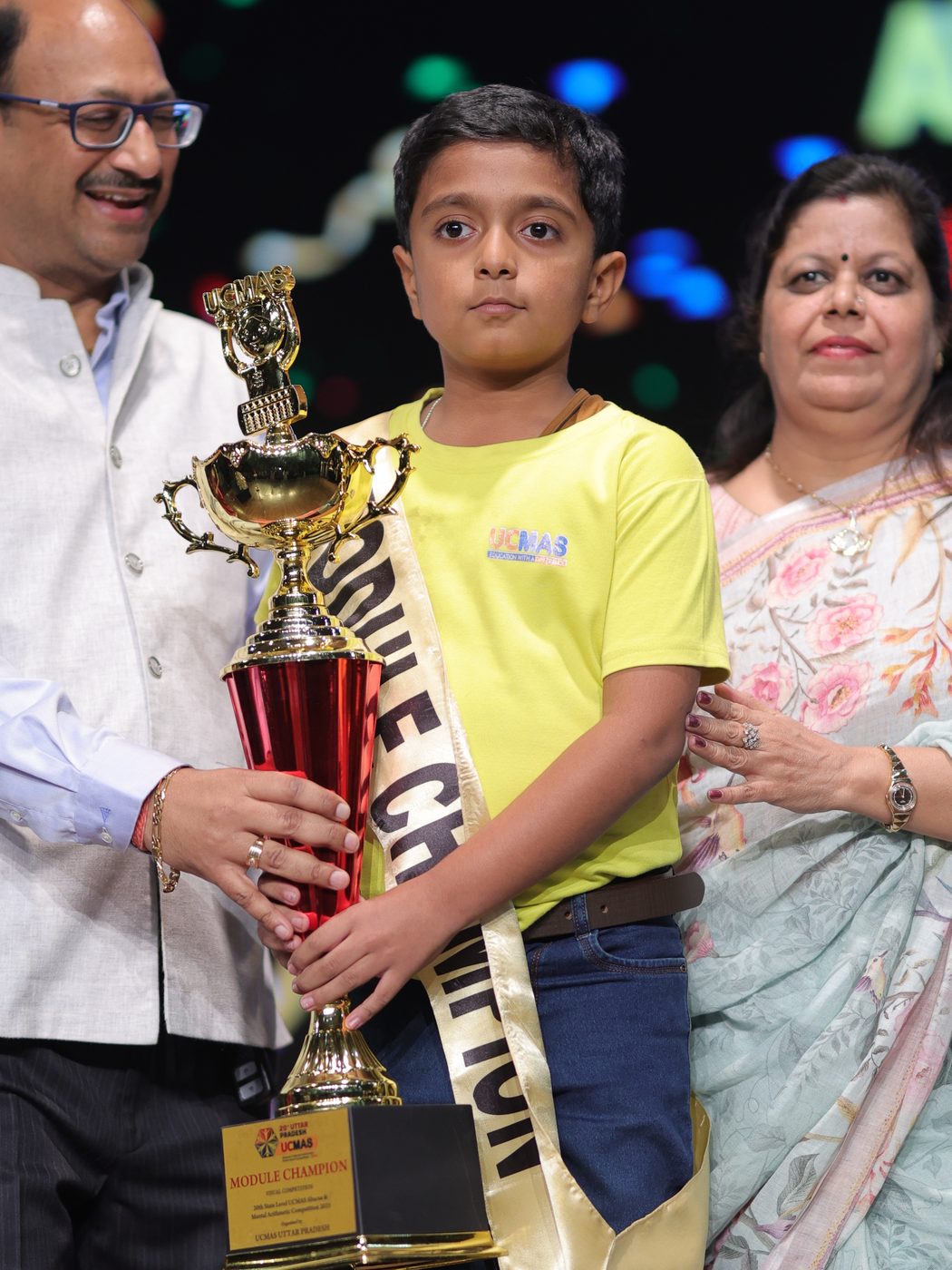 A UCMAS student receiving a trophy at the Uttar Pradesh state-level competition