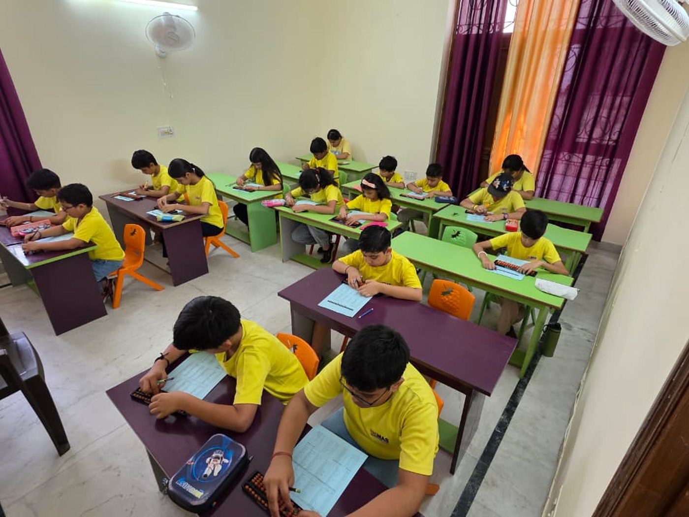 A UCMAS centre run from a room at home in Uttar Pradesh, with a full batch of students at their desks