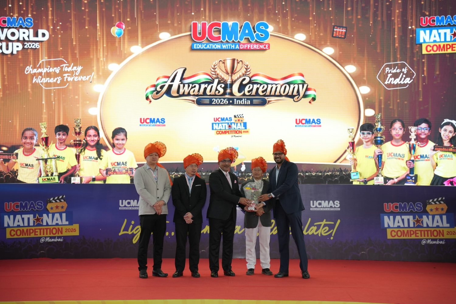 UCMAS Uttar Pradesh with the UCMAS global founder, CEO and general manager and the CEO of UCMAS India at the National Competition awards ceremony in Mumbai
